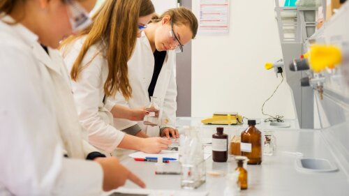 Female Students in the chemistry laboratory