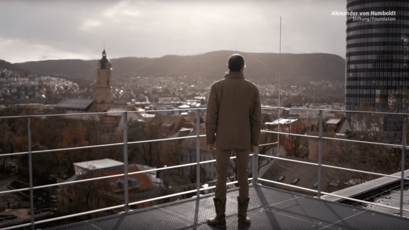 placeholder image — Bas Dutilh stands on a platform and looks over Jena.