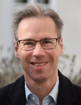 Porträtaufnahme von PD Dr. Tobias Mühlenbruch