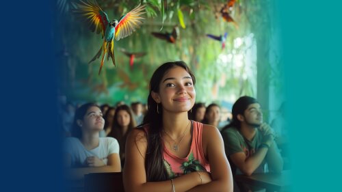 M&auml;dchen sitzt am Tisch und um sie fliegt ein Vogel