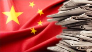 China flag and newspapers