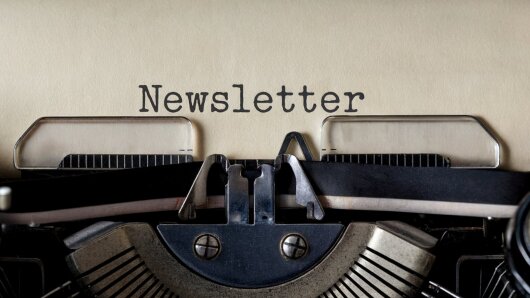 An old typewriter with the word ‘Newsletter’ typed on it.