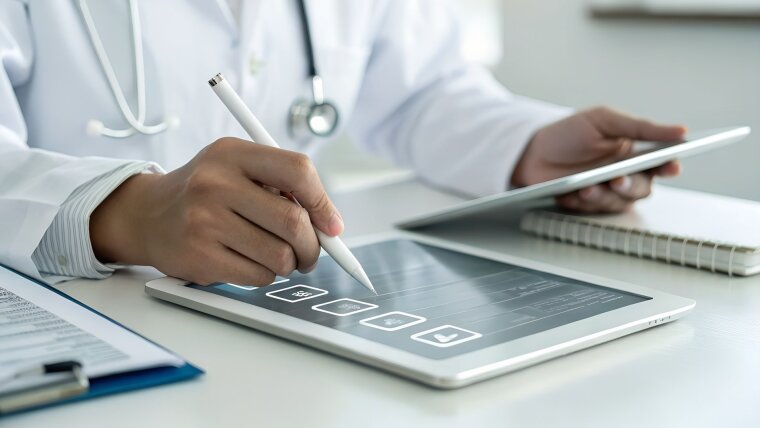A Medicine specialist compares data on two tablets