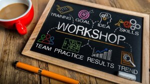 Tafel mit dem Wort Workshop