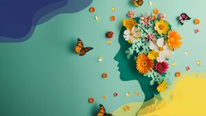Silhouette of a face with flowers and butterflies