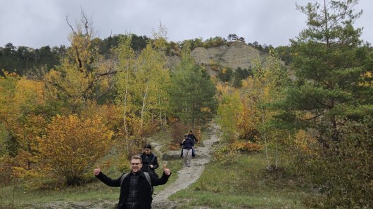 Participants of the autumn school walking in the landscape around Jena