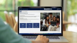 A laptop screen shows the Friedolin 2.0 application portal start page.