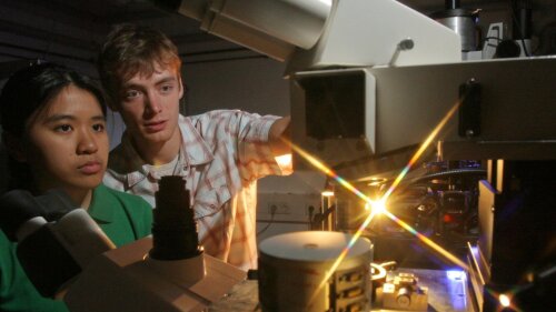 Doctoral researchers in the microspectroscopy lab