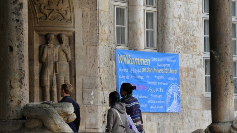 Students in front of the university main building