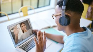 Man and woman talk to each other virtually