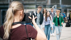 Photographer with students