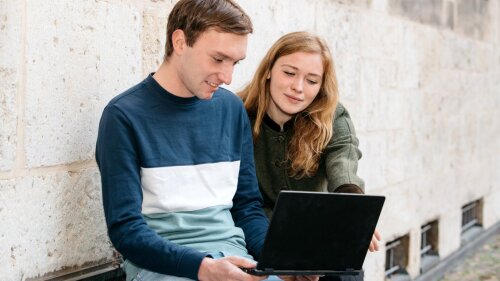 Students at the laptop