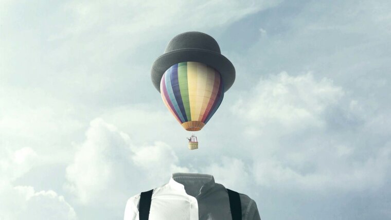 Darstellung eines  Ballons der sich, wie ein Kopf mit Hut bedeckt, von einem Körper in den Wolkenhimmel abhebt.