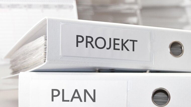 Stack of project folders