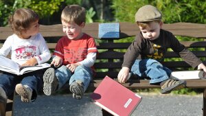 Children playing with books