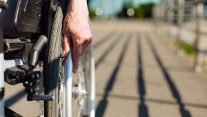 Person sitting in a wheelchair